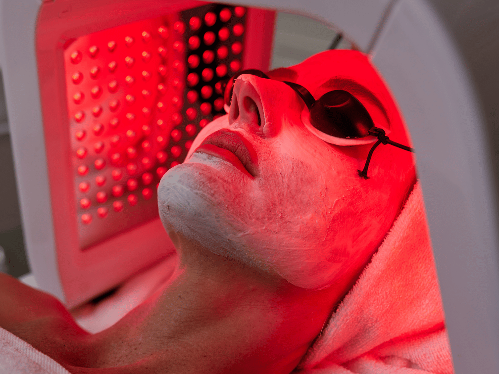 LED light therapy used for acne treatment in Leawood KS to reduce inflammation and bacteria